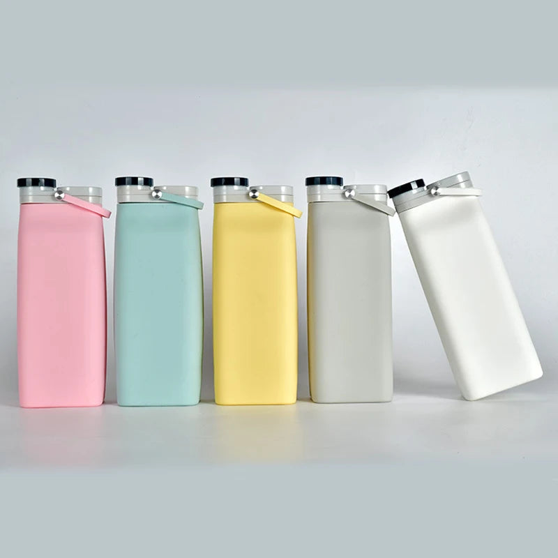 600ML eco-friendly silicone water bottle in all available colors: white, green, pink, gray, and yellow.