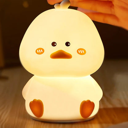Cute duckling-shaped night light, light level can be adjusted by hand tapping.