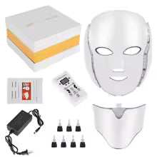 LED face mask with accessories including power adapter, cables, and packaging.