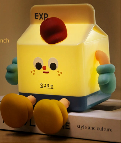 Milk carton night light with features like sleep timer setting, brightness adjustment and 16 color display.
