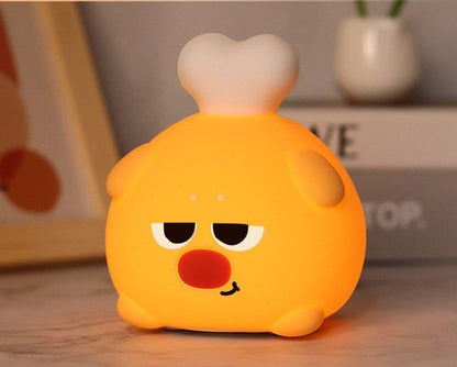 Yellow cute chicken leg cartoon-like night light with a dimmer feature .