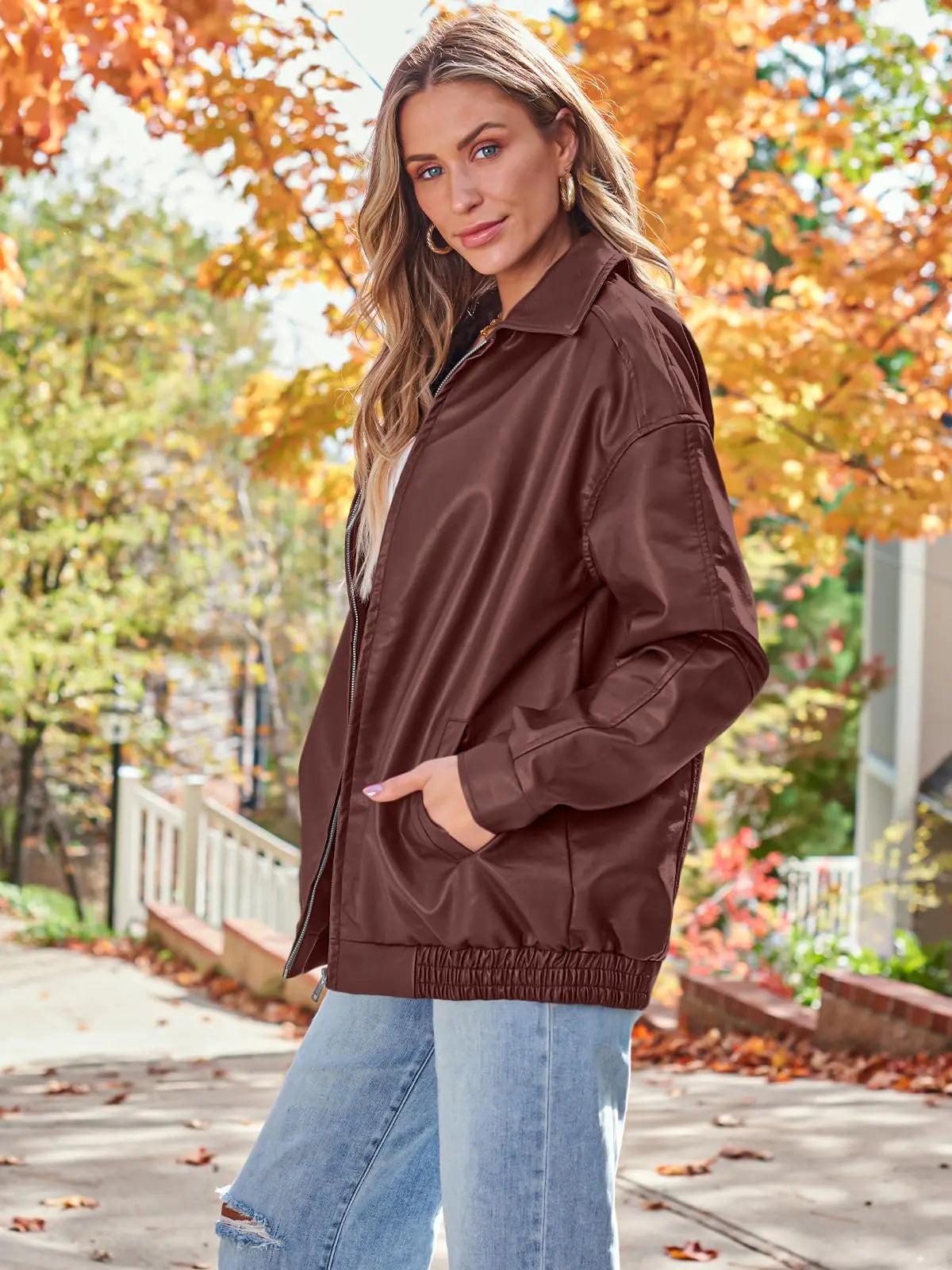 Model wearing a Winered oversized leather jacket styled for fall and winter outfits.
