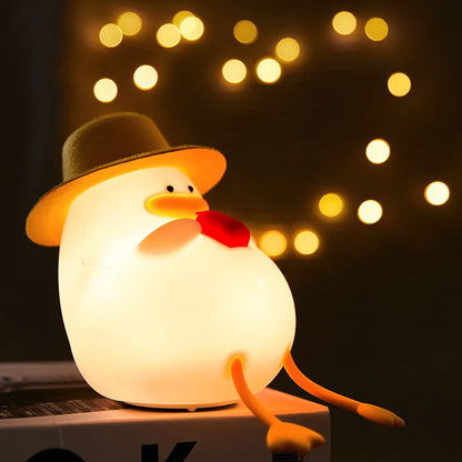 relaxing duck night light with a hat and bow tie, relaxing in a night background with bright light level.