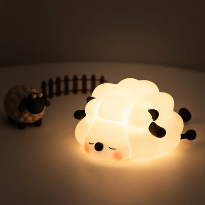 sleepy Sheep-shaped night light emitting a warm glow.