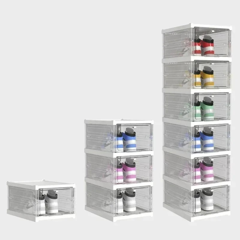 Multiple transparent shoe storage boxes stacked neatly for space-saving organization.
