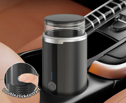 Mini Nespresso-compatible machine fitted in a car cup holder for road trip coffee.