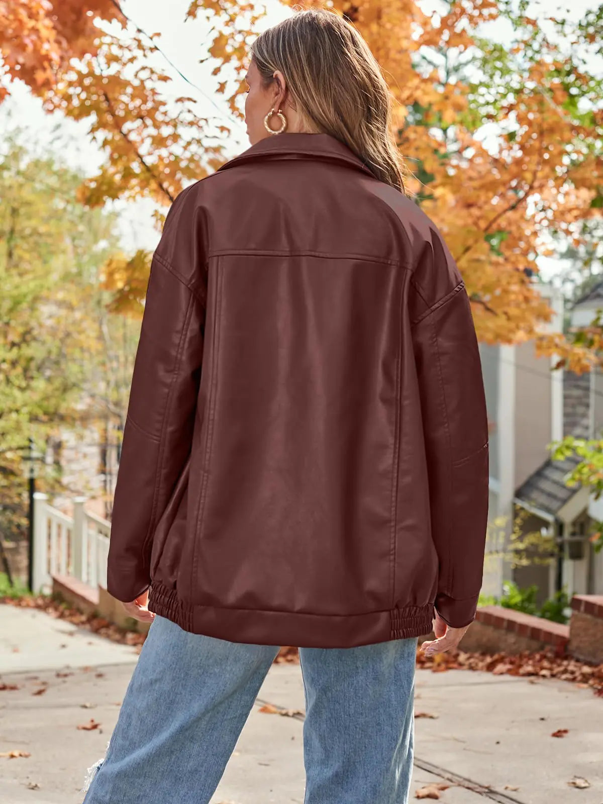 Back view of the oversized faux suede leather jacket showcasing its elegant design.
